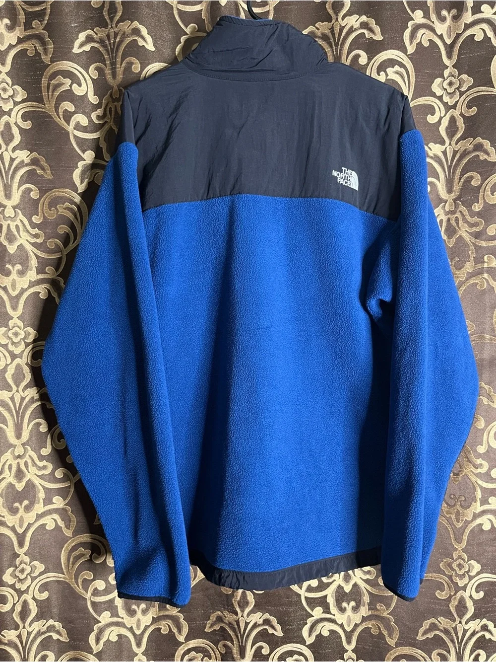 The North Face Men’s Black Denali Jacket with Blue Fleece Lining